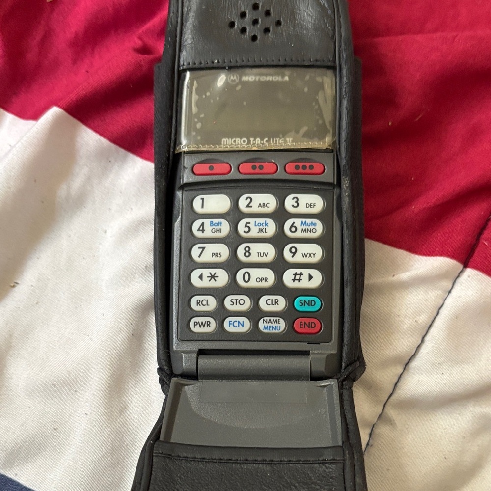 Motorola Flip Phone in Gray with Red Accents